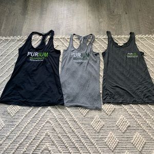 Three purium health product tank tops medium large
